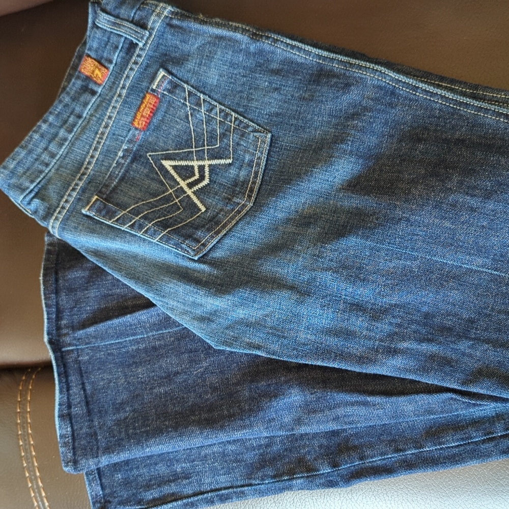 Dark wash women's designer jeans